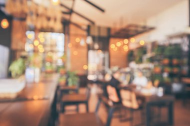 Montaj ürün görüntüleme arka planı için müşteri bulanıklığı olan restoran kafesi ya da kahve dükkânı içi soyut vintage bokeh ışığı