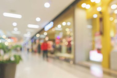 Soyut bulanık modern alışveriş merkezi iç mimarisi Bokeh ışığı ile odaklanmış arka plan