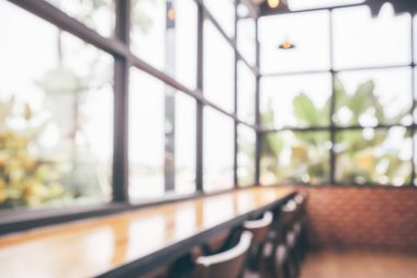 Kafe, iç mekan, soyut bulanıklık. Bokeh light arka plan ile odaklanmış.