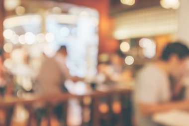 Montaj ürün görüntüleme arka planı için müşteri bulanıklığı olan restoran kafesi ya da kahve dükkânı içi soyut vintage bokeh ışığı