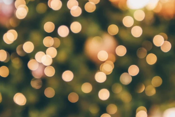 Abstract Christmas Holiday Festive Gold Bokeh Light Tree Blurred Background — Stock Photo, Image