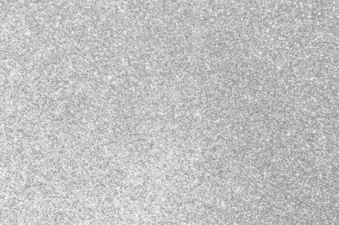 Soyut bulanık gümüş parıltı parlaklığı çözülmüş bokeh ışık arkaplanı