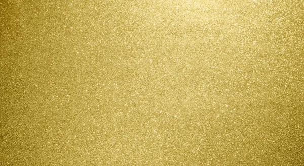Soyut altın parıltısı parıltılı bokeh ışık arkaplanı