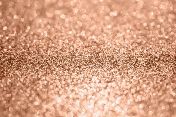 Abstract blur rose gold glitter sparkle defocused bokeh light background