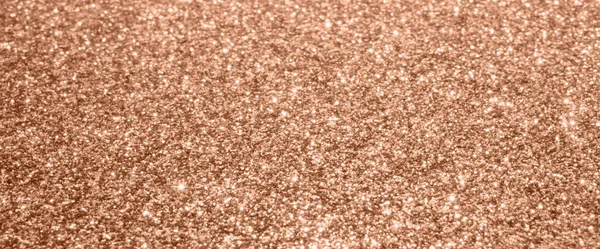 Abstract blur rose gold glitter sparkle defocused bokeh light background