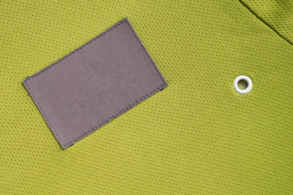 Cucian Perawatan Label Pakaian Patch Pada Kain Poliester Tekstur Olahraga — Stok Foto