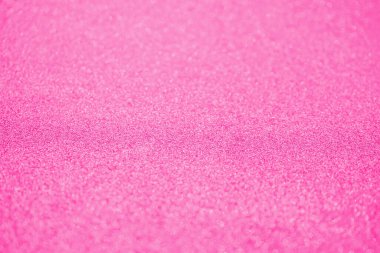 Soyut bulanık pembe parıltılı parıltılı, odaklanmış bokeh ışık arkaplanı