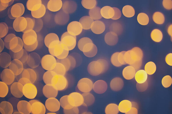 Abstract blur golden bokeh light Christmas holiday background