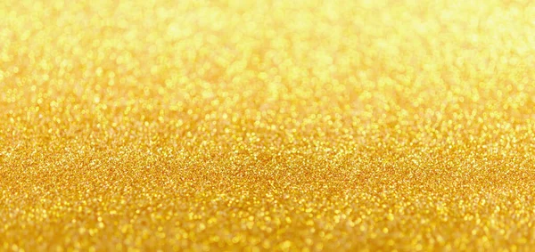 Abstract gold glitter sparkle with bokeh light background