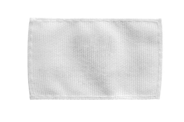 白い背景に隔離された白い空白のランドリーケア服ラベル — ストック写真
