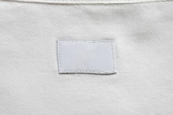 Белая Пустая Этикетка Прачечной Заднем Плане Рубашки — стоковое фото