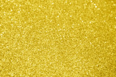 Soyut altın parıltısı parıltılı bokeh ışık arkaplanı