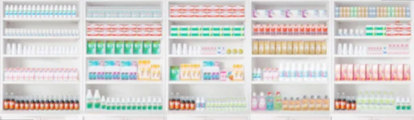 pharmacy drugstore shelves blur pharmaceutical background