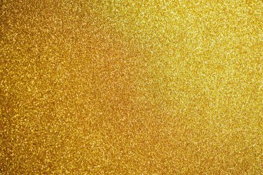 Soyut altın parıltılı parıltı dokusu arkaplanı