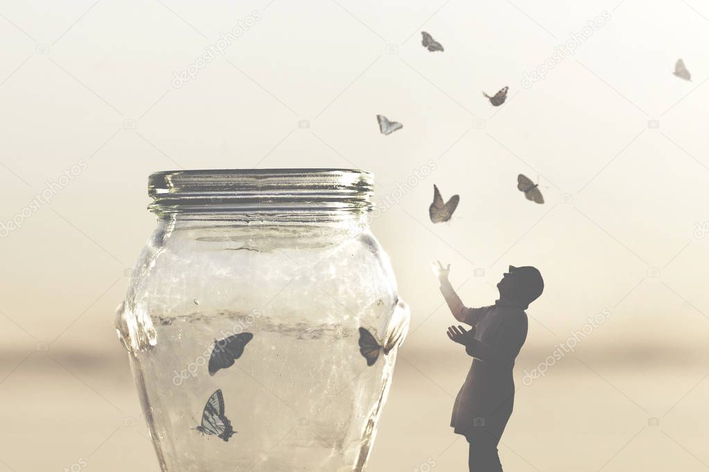 surreal image of a woman who gives freedom to butterflies captive in a vase
