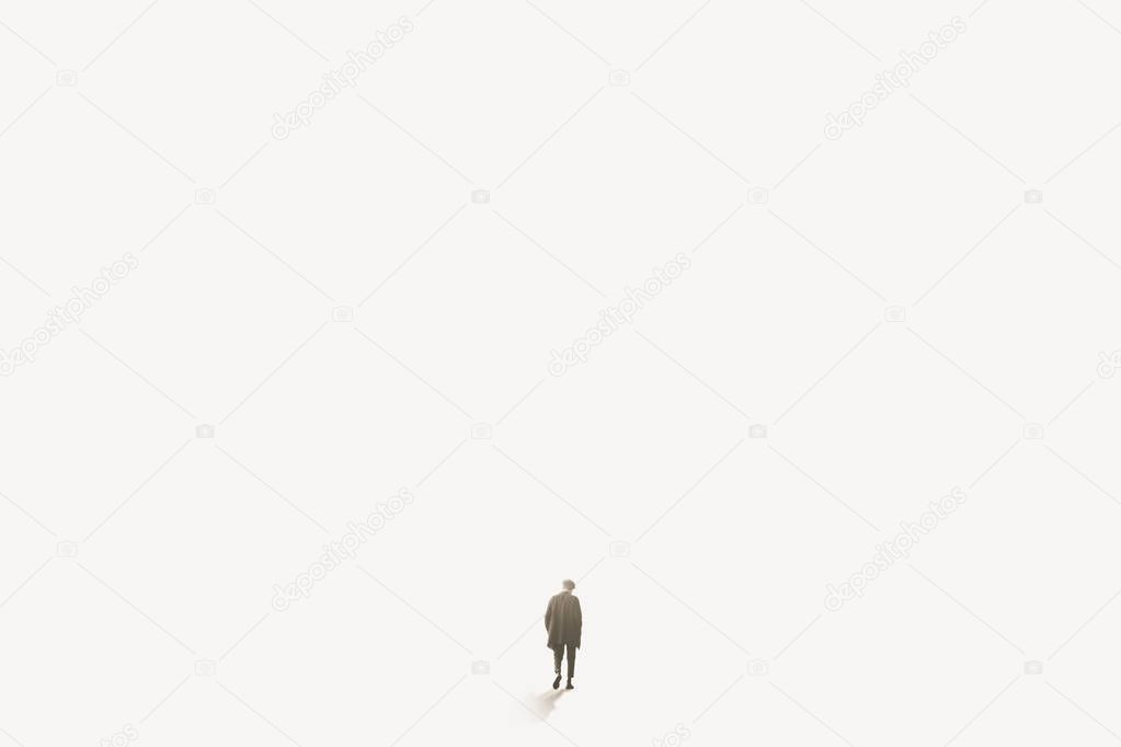 lonely man walks towards infinity in the fog, concept of loneliness