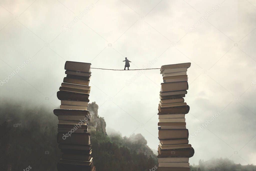 success and knowledge concepts of a man walking on a rope to move from one pile of books to another