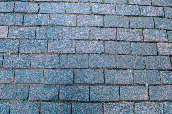 Texture of paving stones made of stone