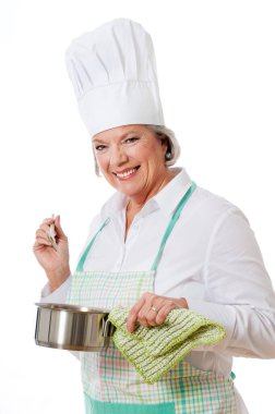 Şapkalı ve önlüklü yaşlı aşçı.