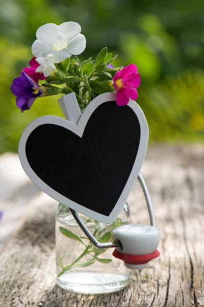 Wooden heart with flowers