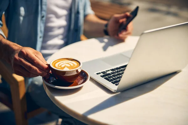 stock image Focused photo on male hand that taking cup