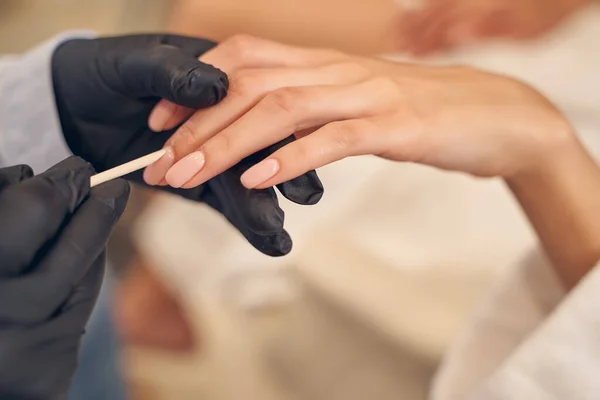 Manicure treatment performed by qualified specialist in studio — Stock Photo, Image