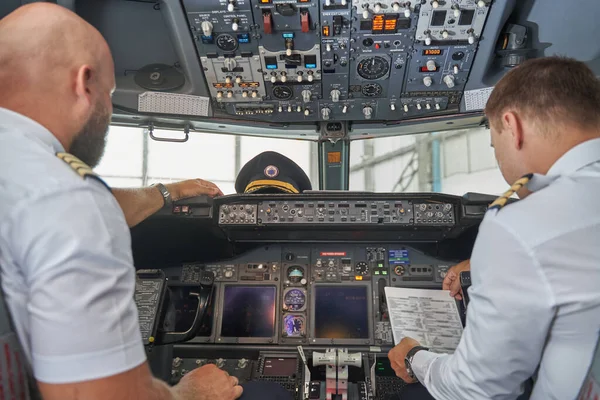Aircraft cockpit with two colleagues in it — Stock Photo, Image