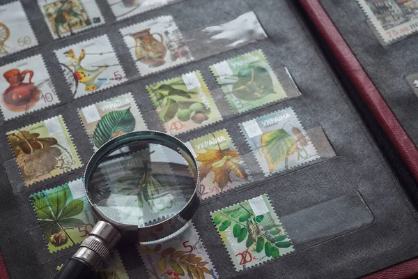 Still Life Stamps Album Magnifying Glass Ukrainian Stamps — Stock Photo, Image