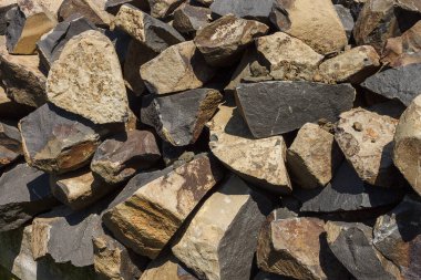 Büyük inşaat taşlarını parçaladı. Desenli arkaplan.