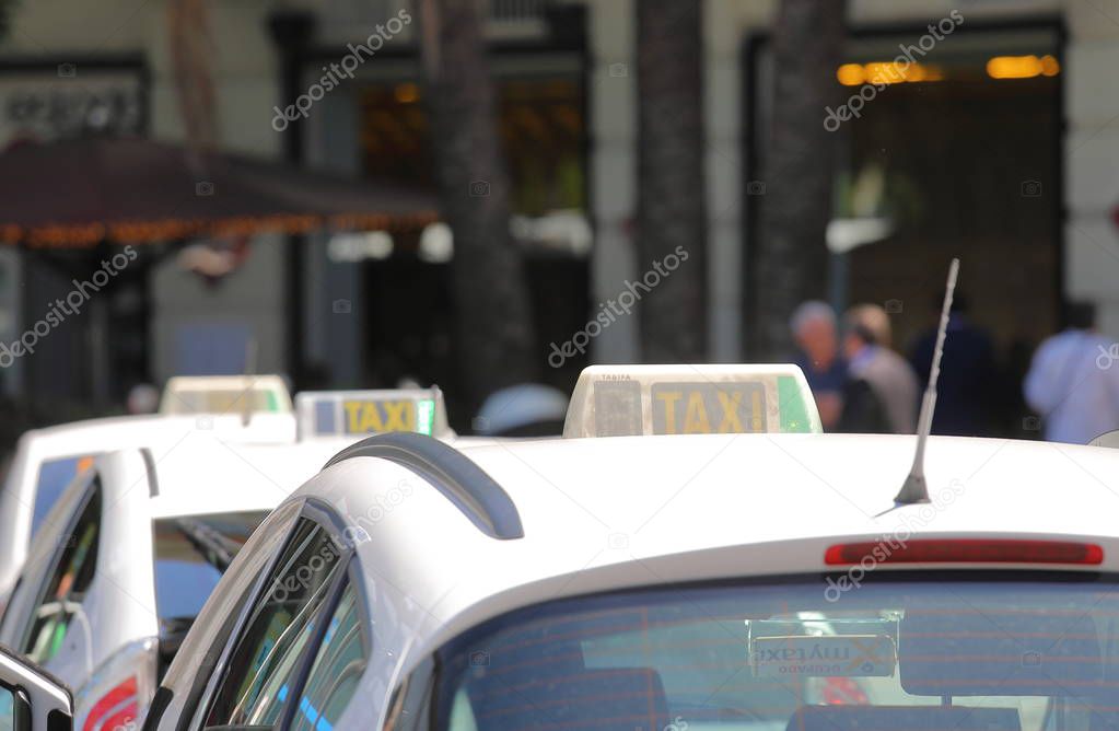 MADRID SPAIN - MAY 28, 2019: Taxis wait for passengers in downtown Madrid Spain