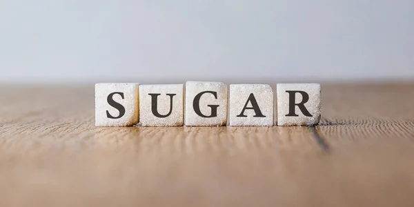 Sugar Cubes English Word Sugar Written Square Blocks Promoting More — Stock Photo, Image
