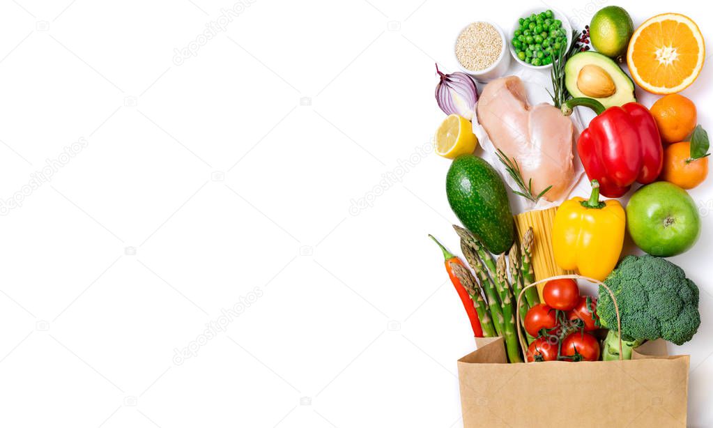 Healthy eating background. Healthy food in paper bag meat, fruit