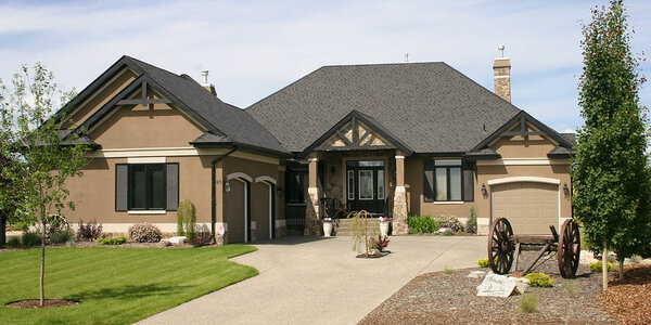 Large, single family home beautifully designed with landscaping.