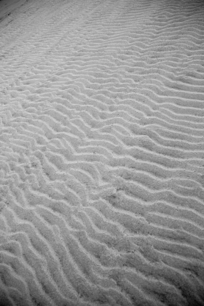 砂浜の砂のイメージ 水と風による地面の質感 — ストック写真