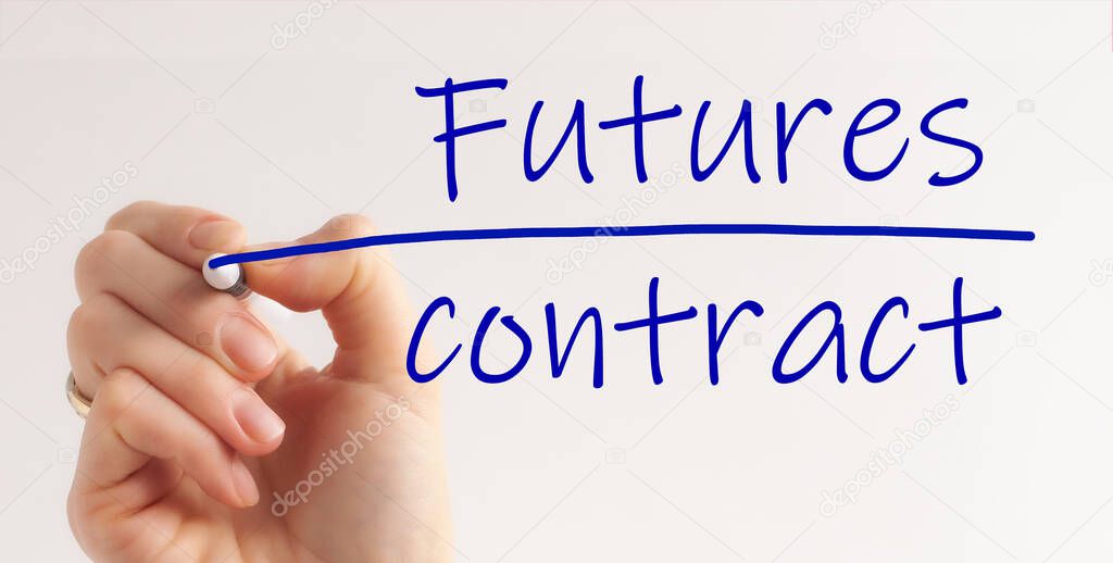Hand writing inscription Futures Contract with marker, concept, the letters in blu