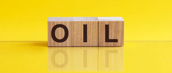 Oil Word Written Wooden Block Image Mirrored Glossy Surface Your — Stock Photo, Image