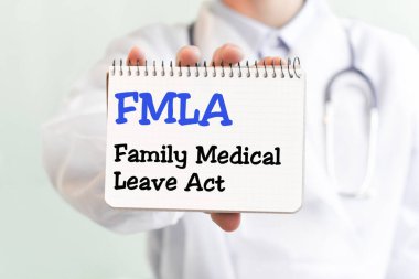 Doctor writing word FMLA Family Medical Leave Act with blu marker, Medical concept clipart