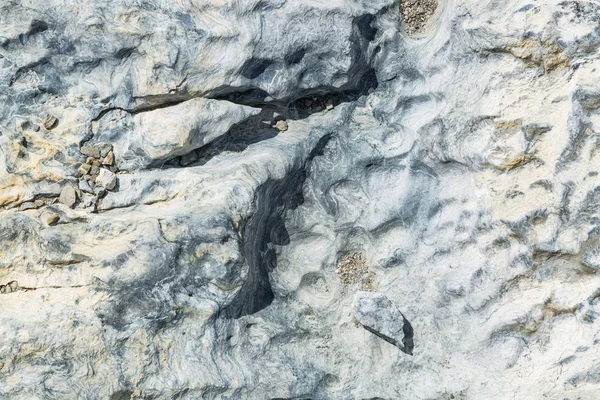 Postglaciala stenens yta med massa sprickor — Stockfoto