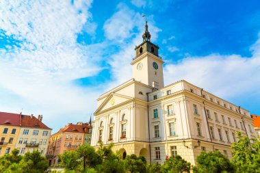 Old town square with town hall in city of Kalisz, Poland clipart
