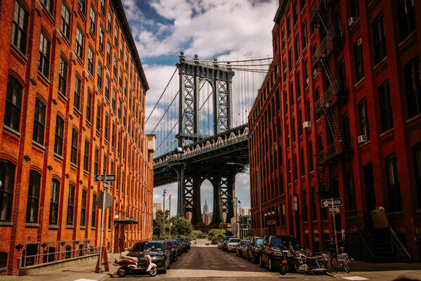 Manhattan bridge seen from a Washington Street in Brooklyn street in perspective, New York City, USA