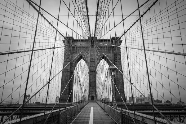 Brooklyn Bridge architecture in black and white tone, New York City, USA