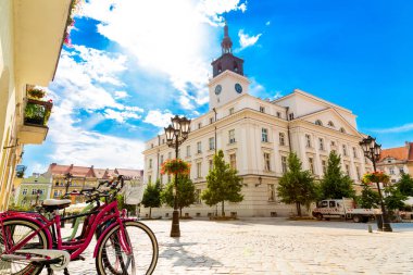 Old town square with town hall in city of Kalisz, Poland clipart