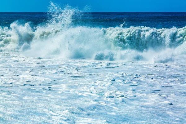 Big blue ocean waves with white foam — Stock Photo, Image