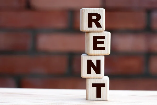 Concept Word Rent Cubes Background Brick Wall Business Concept — Stock Photo, Image