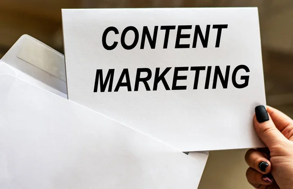 CONTENT MARKETING words written in letter from envelope. Business concept.