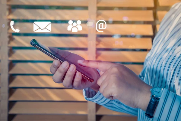 Double exposure of businessman using a social media marketing concept with notification icons with Investors are calculating on calculator investment costs, business finance concept.