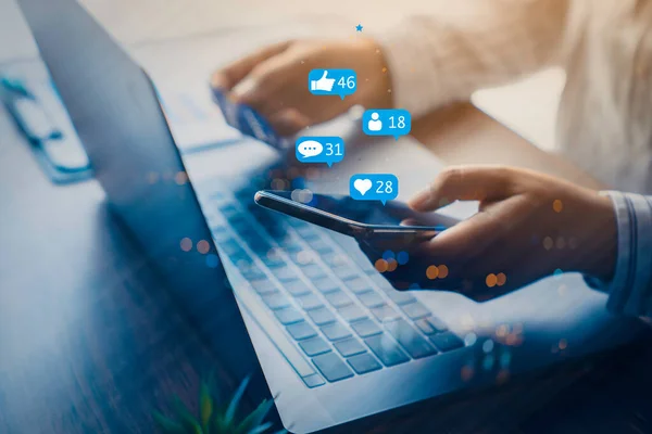 Double exposure of businessman using a social media marketing concept with notification icons with Investors are calculating on calculator investment costs, business finance concept.