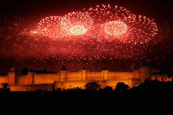 the fireworks during the French national holiday of July 14 above the medieval city of Carcassonne