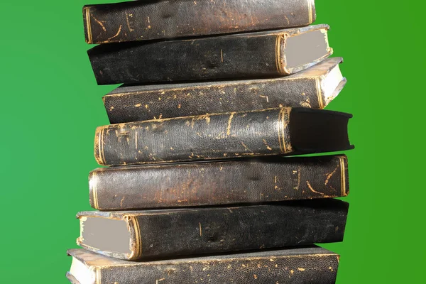 many old books with black leather covers stacked
