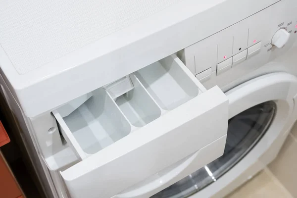Поднос для стиральной машины — стоковое фото